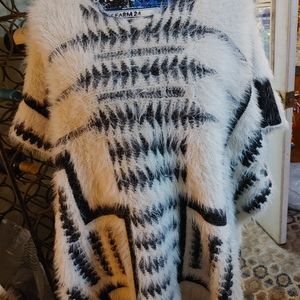 PONCHO LADIES O/S.  GENTLY WORN CONDITION